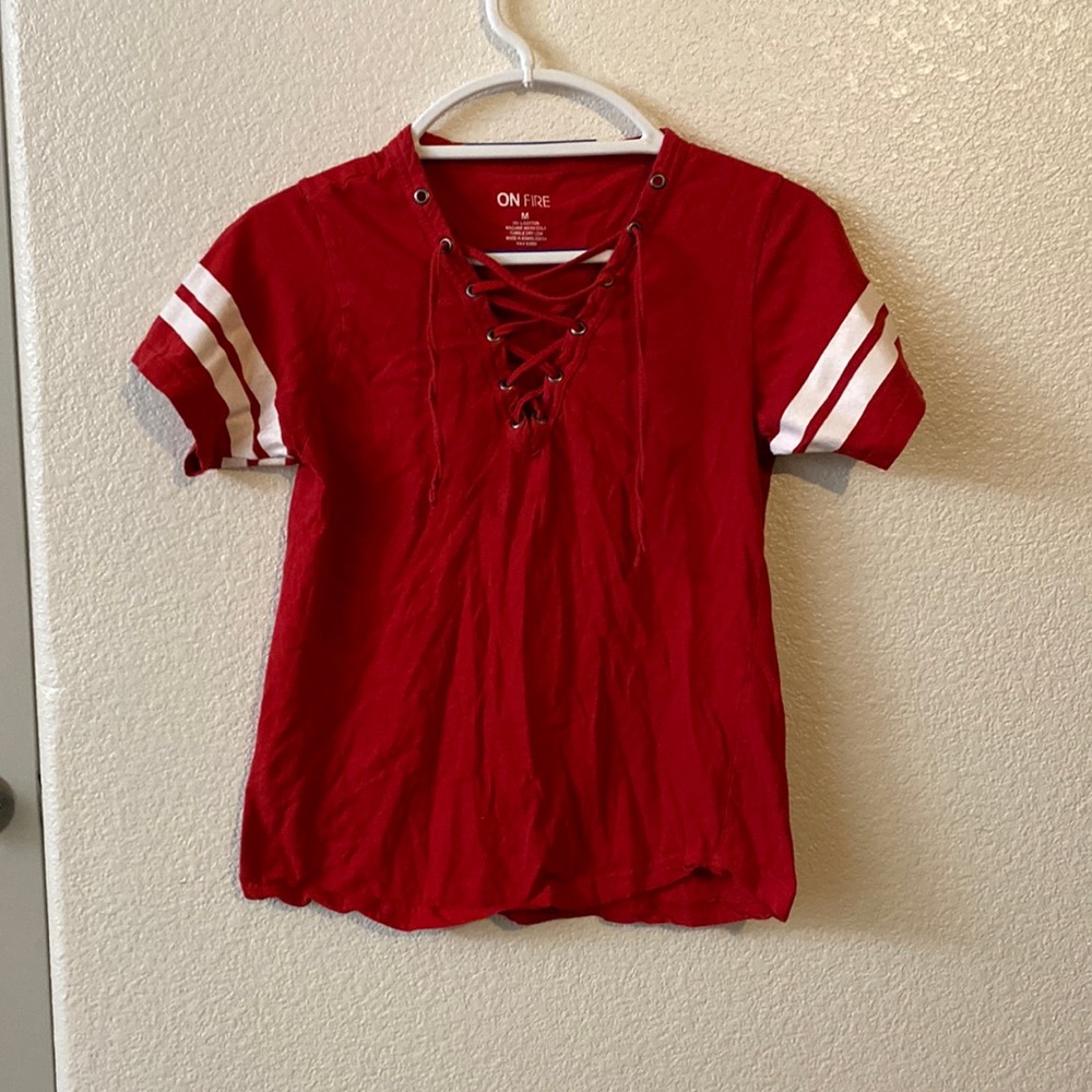 I am selling this On Fire red shirt size Medium
